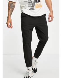 ASOS DESIGN tapered chino trackies with elasticated waist in black