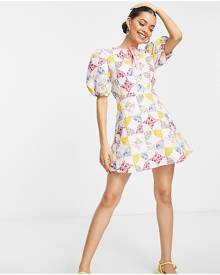 ASOS Petite ASOS DESIGN Petite mini skater dress with puff sleeves in pink patchwork floral-Multi