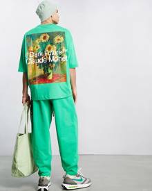 ASOS Dark Future x Claude Monet oversized t-shirt with large back graphic print in green ASOS Dark Future x Claude Monet oversized t-shirt with large back graphic print in green