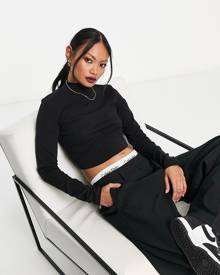 ASOS DESIGN turtleneck crop top in black