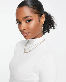 ASOS Petite ASOS DESIGN Petite turtleneck crop top in white