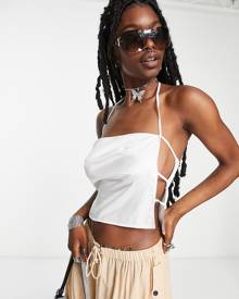 ASOS DESIGN strappy cami top with open side in ivory-White