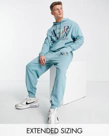 ASOS DESIGN ASOS Actual relaxed trackies with logo print in light blue (part of a set)