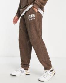 ASOS DESIGN ASOS Dark Future relaxed trackies in soft towel jersey with logo embroidery in brown (part of a set)