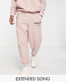 ASOS DESIGN ASOS Daysocial relaxed trackies in polar fleece with logo embroidery in pink (part of a set)-Brown