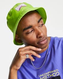 ASOS DESIGN bucket hat in bright green with escapism print (part of a set)