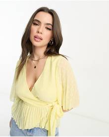 ASOS DESIGN Petite dobby wrap short sleeve blouse with pleated peplum hem in lemon-Yellow