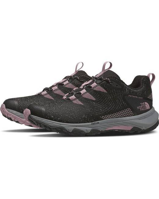 black and purple tennis shoes