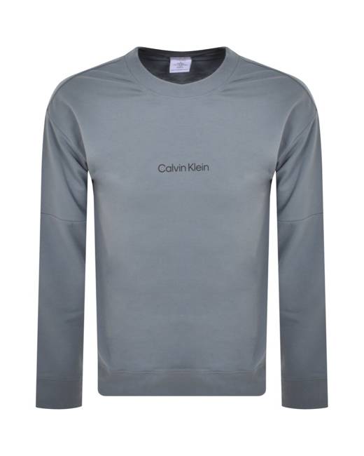 Calvin Klein Form To Body Tanga Brief With Tonal Logo In Cedar-neutral