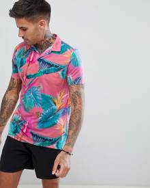 ASOS DESIGN polo with all over floral print and rever collar-Pink