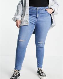 Levi's Plus 721 hi-rise skinny jeans in mid wash blue