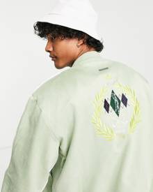 Liquor N Poker bomber jacket in sage green with golf club embroidery