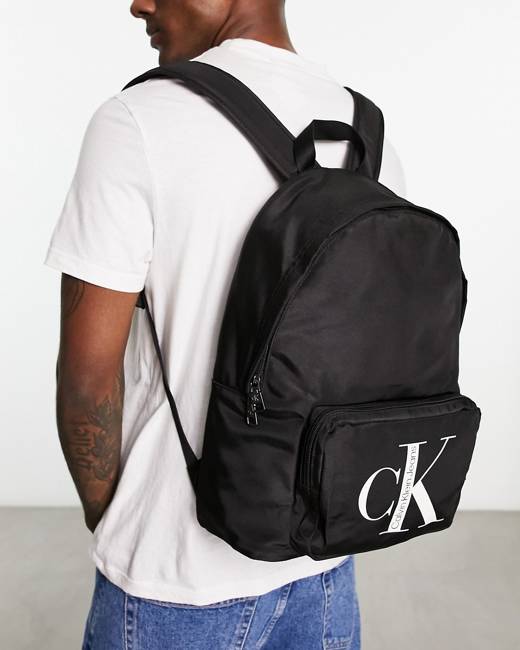 Calvin Klein Jeans City Flap Logo Patch Backpack - Farfetch