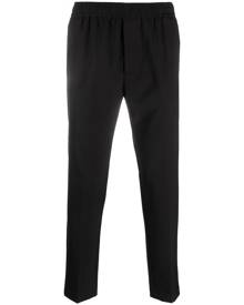 PMD logo-patch tapered trousers - Black