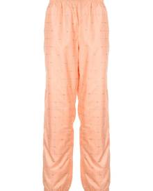 Supreme logo grid tapered trousers - Orange