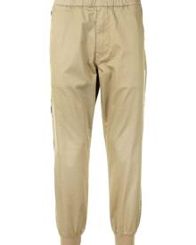 AAPE BY *A BATHING APE® Aape Universe tapered trousers - Brown
