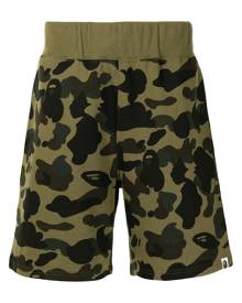 A BATHING APE® camouflage-print cotton track shorts - Green