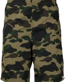 A BATHING APE® camouflage-print cotton track shorts - Green