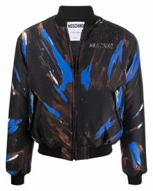 Moschino logo paint print bomber jacket - Brown