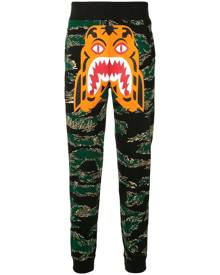 A BATHING APE® - camouflage print track pants - men - Cotton - M, L, XL - Green