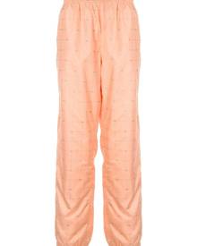 Supreme - logo grid tapered trousers - men - Polyester - M, L - ORANGE