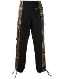 Moschino - camouflage panel track pants - men - Cotton - 46, 48, 44, 50 - Green