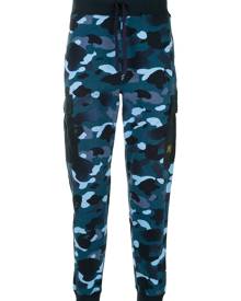 A BATHING APE® - camouflage-print cargo track pants - men - Cotton - M - Blue