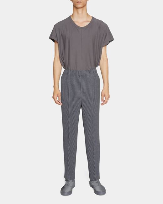 Issey Miyake Pleated balloonleg Trousers  Farfetch