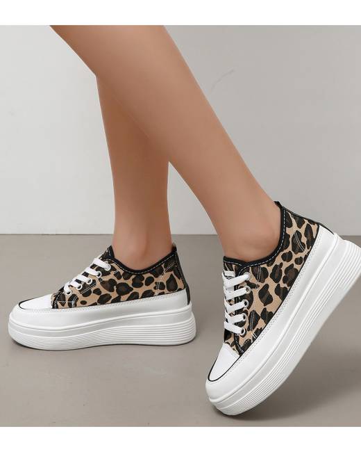 puma pulsar wedge sneakers in animal print