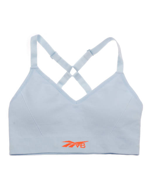 Reebok Kerys logo crop top sports bra in blue and cream