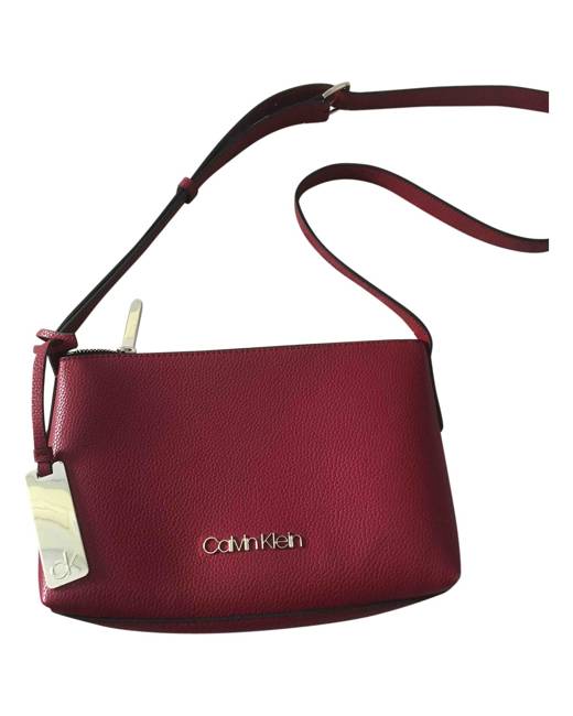 Brown Leather Calvin Klein handbag  Calvin klein handbags, Handbag, Calvin  klein bag