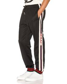 Gucci Technical Jersey Pant in Black & Ivory & Live Red - Black,Stripes. Size M (also in S).