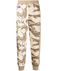 AAPE BY *A BATHING APE® camouflage-print cotton-blend track trousers