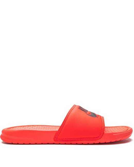 Orange nike shop benassi slides