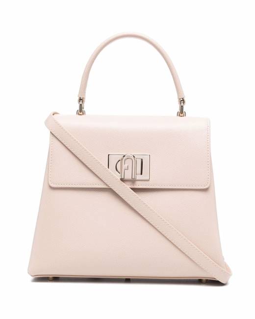 Furla Viva Mini Pochette crafted in Suede with crystal floral  embellishments plays on the timelessness of the chain bag with a sliding  strap that goes from shoulder to crossbody. Featuring flap top