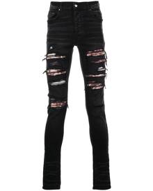 AMIRI ripped skinny jeans - Black