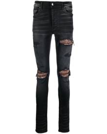 AMIRI ripped skinny-fit jeans - Black