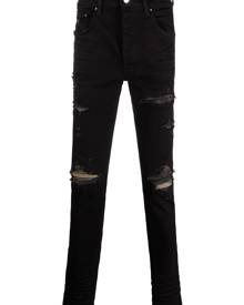 AMIRI distressed mid-rise skinny jeans - Black