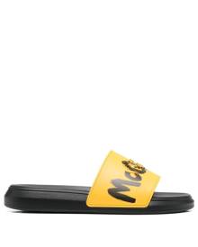 Alexander McQueen graffiti-logo slip-on slides - Yellow