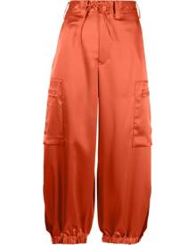ASOS DESIGN parachute cargo pants in orange