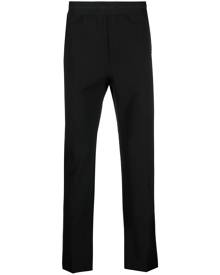 MSGM logo-waistband tapered trousers - Black