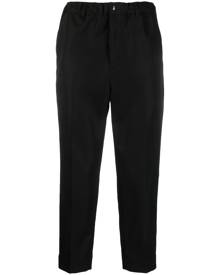 Neighborhood logo-patch tapered-leg trousers - Black