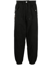 EVISU Daikokuten logo-embroidered tapered trousers - Black