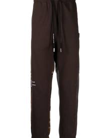 AAPE BY *A BATHING APE® patchwork tapered track pants - Brown